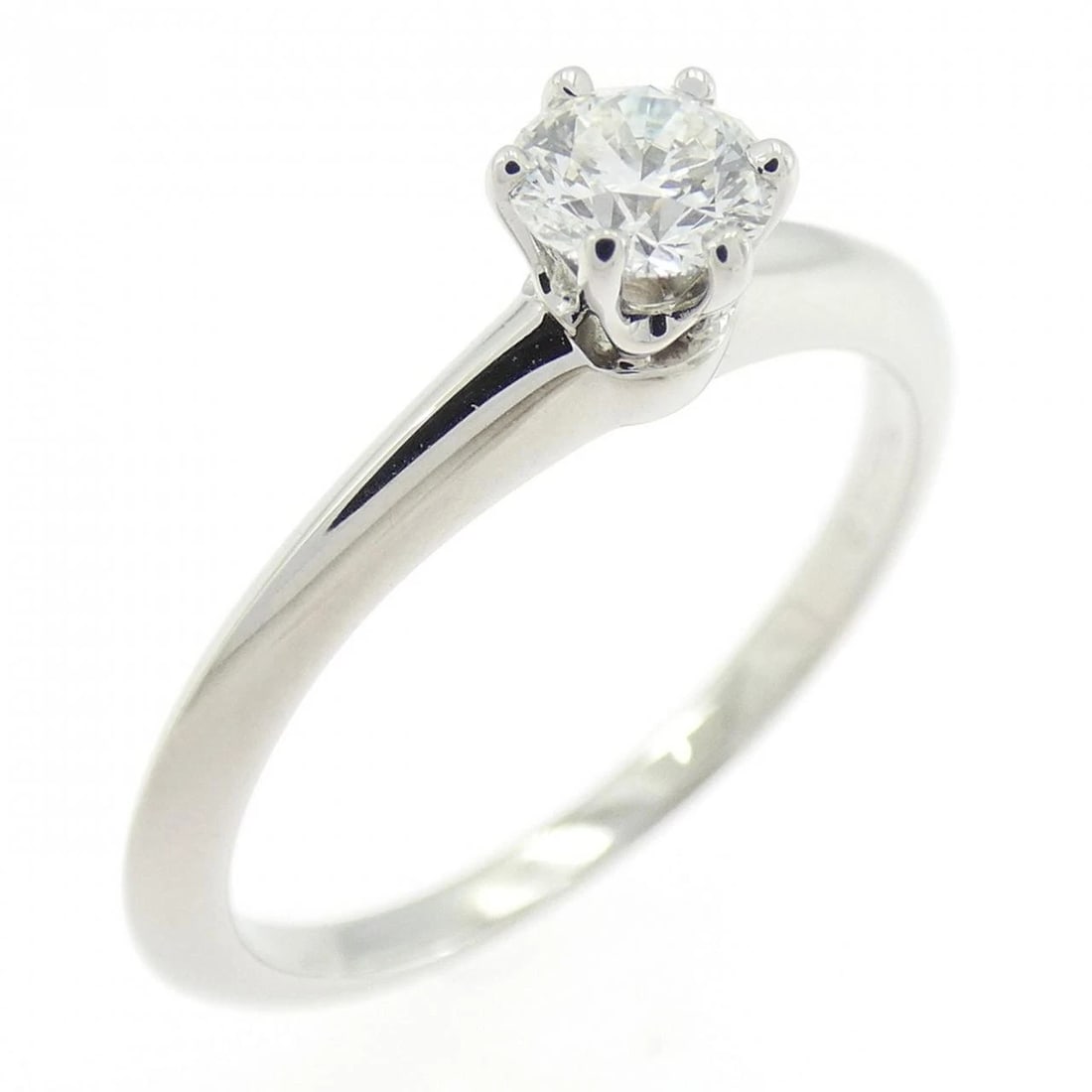 TIFFANY CLASSIC SOLITAIRE RING: Tiffany Classic Solitaire Ring Brand: Tiffany Type: Ring Material: Platinum 950 Main Stone/Creation Natural Color: Platinum Size: 5-5.5 (US size) Accessories: None Accessories Notice: When