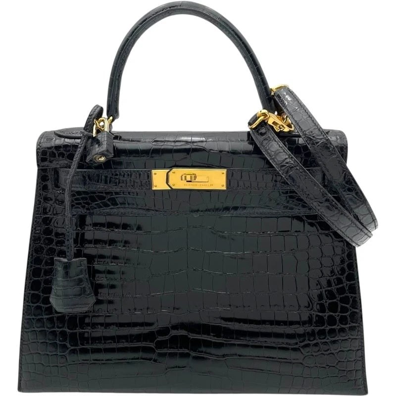 HERMES KELLY 28 OUTER SEWING HANDBAG: HERMES Kelly 28 outer sewing Handbag Brand: HERMES Type: Handbag Material: Polo Sulce Color: Black GD Hardware Size: W11.0 x H8.5x D4.5inch Shoulder:35.0inch Accessories: None Accessories