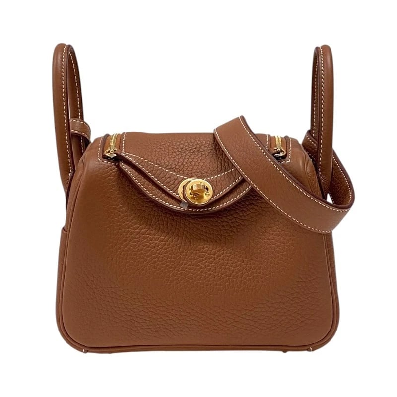 HERMES LINDY MINI SHOULDER BAG: HERMES Lindy mini Shoulder Bag Brand: HERMES Type: Shoulder Bag Material: Taurillon Clemence Color: Gold Gold Hardware Size: W7.1 x H5.1x D3.5inch Shoulder:35.4inch Accessories: None