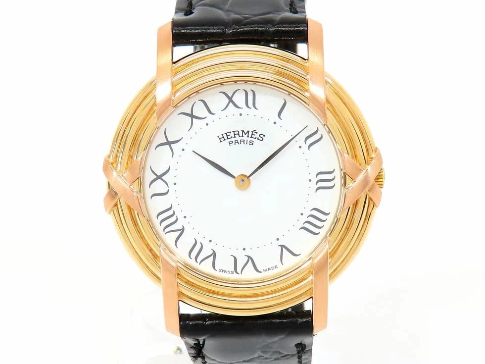 HERMÈS RUBAN K18YG/PG AFTERMARKET LEATHER STRAP QUARTZ WATCH: Hermès Ruban K18YG/PG Aftermarket Leather Strap Quartz Watch Brand: HERMÈS Type: Wrist watch Material: [ Material ] 18K yellow gold/pink gold, GP metal (genuine buckle) Color: Dial White Eto Siz