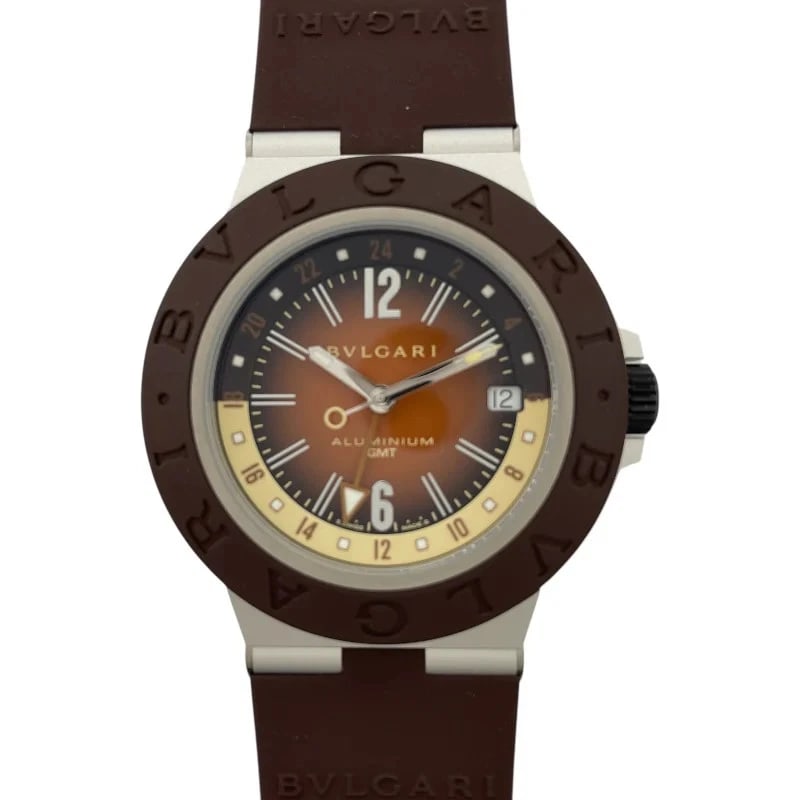 BVLGARI ALUMINIUM GMT FENDER BROWN WATCH: Bvlgari Aluminium GMT Fender brown Brand: BVLGARI Type: Wrist watch Material: Aluminum/rubber belt Color: Dial Brown Size: [ Case size ] 40mm / Case shape: Round face / Case thickness: 10mm [ Arm