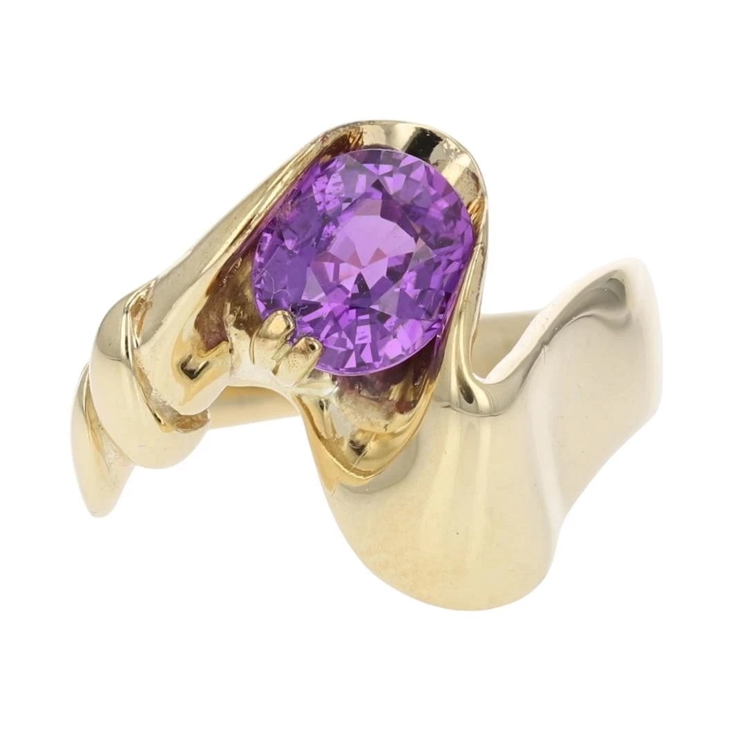 LAB-CREATED OVAL PINK SAPPHIRE SOLITAIRE RING: Lab-Created Oval Pink Sapphire Solitaire Ring Brand: Unbranded Type: Ring Material: 14k Yellow Gold Main Stone/Creation Sapphire Color: Main Stone Color: Medium Moderately Strong Purple Red Size: