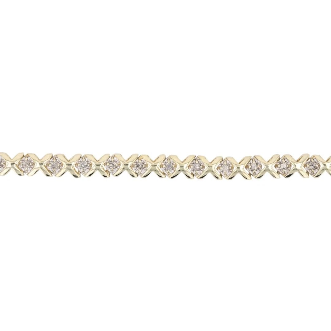 ROUND CUT DIAMOND TENNIS BRACELET 10K YELLOW GOLD: Round Cut Diamond Tennis Bracelet 10k Yellow Gold Brand: Unbranded Type: Bracelet Material: 10k Yellow Gold Main Stone/Creation Natural Color: None Size: Bracelet Measurement: 7.25" Length /