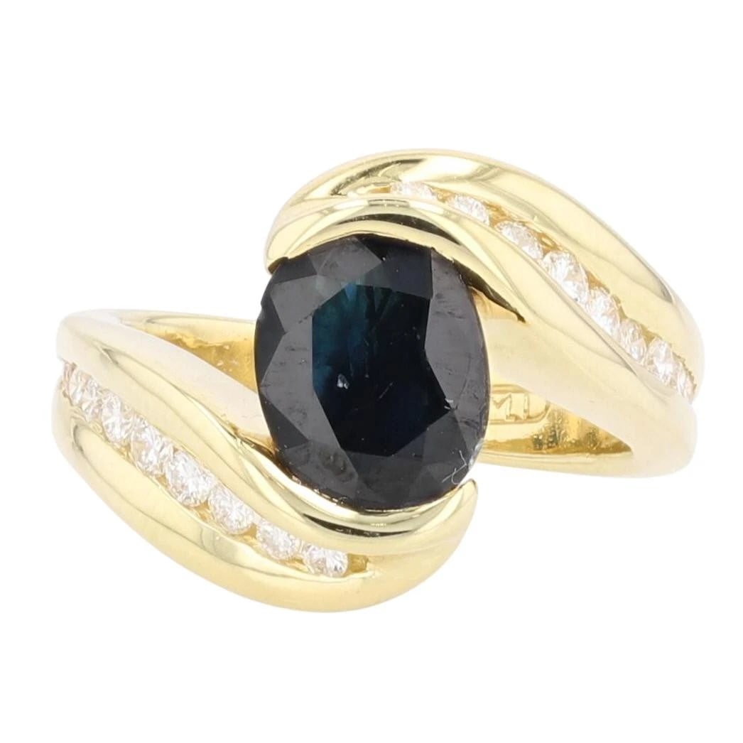 SAPPHIRE WITH DIAMOND ACCENTS BYPASS RING (1 of 5)