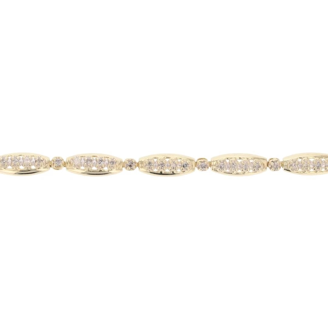 DIAMOND PRONG-SET BRACELET 10K YELLOW GOLD: Diamond Prong-Set Bracelet 10k Yellow Gold Brand: Unbranded Type: Bracelet Material: 10k Yellow Gold Main Stone/Creation Natural Color: None Size: Bracelet Measurement: 7.25" Length / 5.6mm 