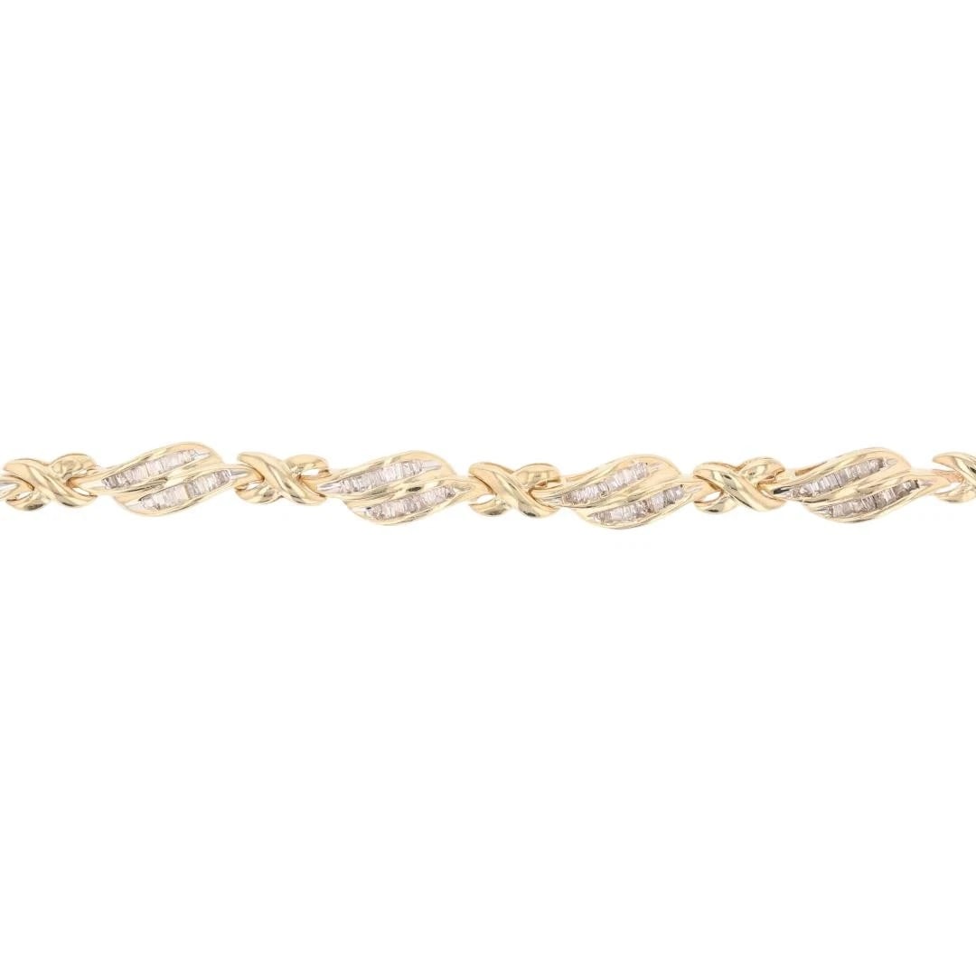 BAGUETTE DIAMOND X-LINK TENNIS BRACELET 10K YELLOW GOLD: Baguette Diamond X-Link Tennis Bracelet 10k Yellow Gold Brand: Unbranded Type: Bracelet Material: 10k Yellow Gold Main Stone/Creation Natural Color: None Size: Bracelet Measurement: 7.25"