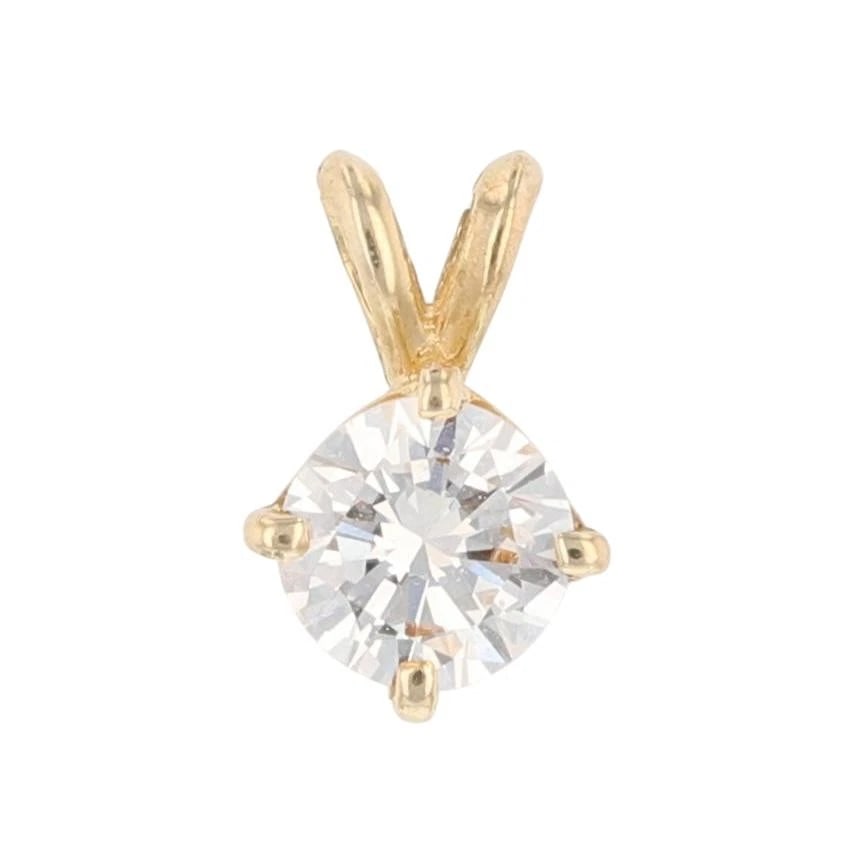 ROUND DIAMOND SOLITAIRE PRONG-SET BAIL PENDANT: Round Diamond Solitaire Prong-Set Bail Pendant Brand: Unbranded Type: Pendant Material: 14k Yellow Gold Main Stone/Creation Natural Color: None Size: Pendant Measurement: 10.2 x 6.9mm Main