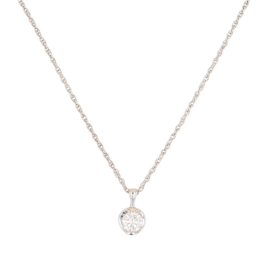 SIRENA ROUND DIAMOND SOLITAIRE PENDANT ON: Sirena Round Diamond Solitaire Pendant on Brand: Midas Type: Necklace Material: 10k White Gold Main Stone/Creation Natural Color: None Size: Pendant Measurement: 10.8mm Length / 6.2mm Width