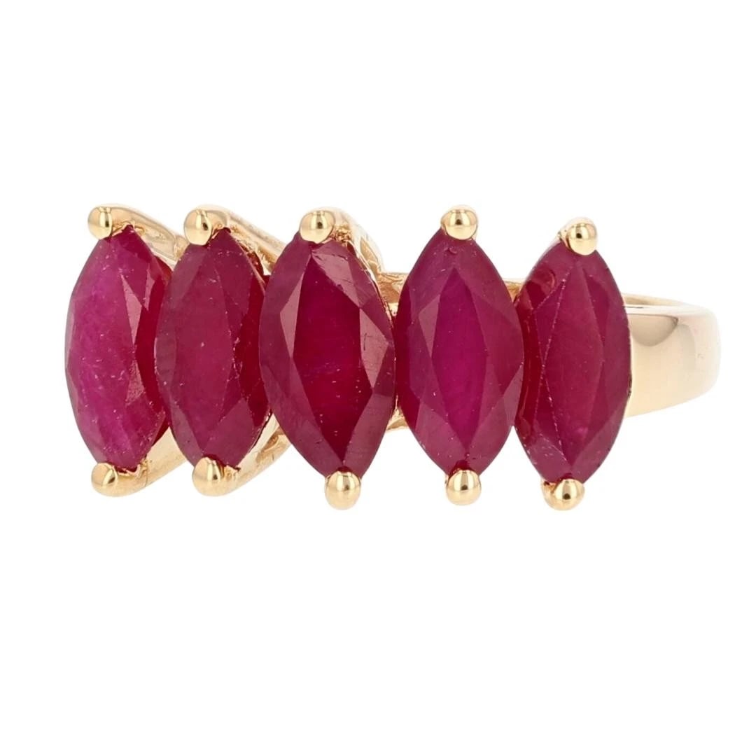 MARQUISE CUT RUBY FIVE-STONE PYRAMID BAND RING: Marquise Cut Ruby Five-Stone Pyramid Band Ring Brand: Unbranded Type: Ring Material: 14k Yellow Gold Main Stone/Creation Ruby Color: Main Stone Color: Purplish Red Size: 6 US Accessories: None