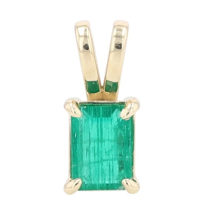 EMERALD CUT EMERALD SOLITAIRE PENDANT 14K YELLOW GOLD: Emerald Cut Emerald Solitaire Pendant 14k Yellow Gold Brand: Unbranded Type: Pendant Material: 14k Yellow Gold Main Stone/Creation Natural Color: Main Stone Color: Green Size: Pendant