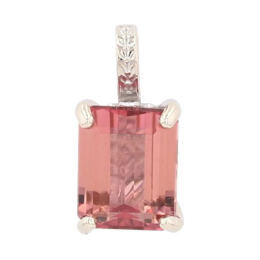 EMERALD CUT PINK TOURMALINE SOLITAIRE PENDANT: Emerald Cut Pink Tourmaline Solitaire Pendant Brand: Unbranded Type: Pendant Material: 14k White Gold Main Stone/Creation Natural Color: None Size: Pendant Measurement: 16.6mm Length / 8.5mm 