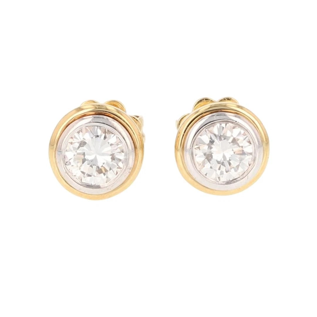 ROUND DIAMOND BEZEL-SET SOLITAIRE STUD PAIR EARRINGS: Round Diamond Bezel-Set Solitaire Stud Pair Earrings Brand: Unbranded Type: Earrings Material: 18k Multi-Tone Gold Main Stone/Creation Natural Color: None Size: Earring Measurement: 7 x 7mm 