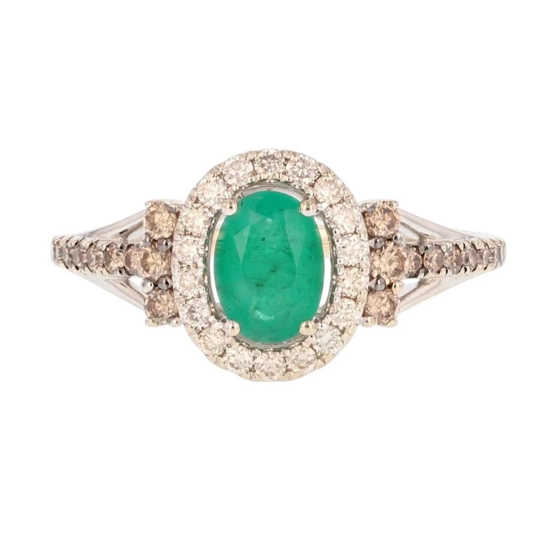 LE VIAN OVAL CUT EMERALD WITH DIAMOND HALO RING: Le Vian Oval Cut Emerald with Diamond Halo Ring Brand: Le Vian Type: Ring Material: 14k White Gold Main Stone/Creation Natural Color: Main Stone Color: Medium Moderately Strong Very Slightly