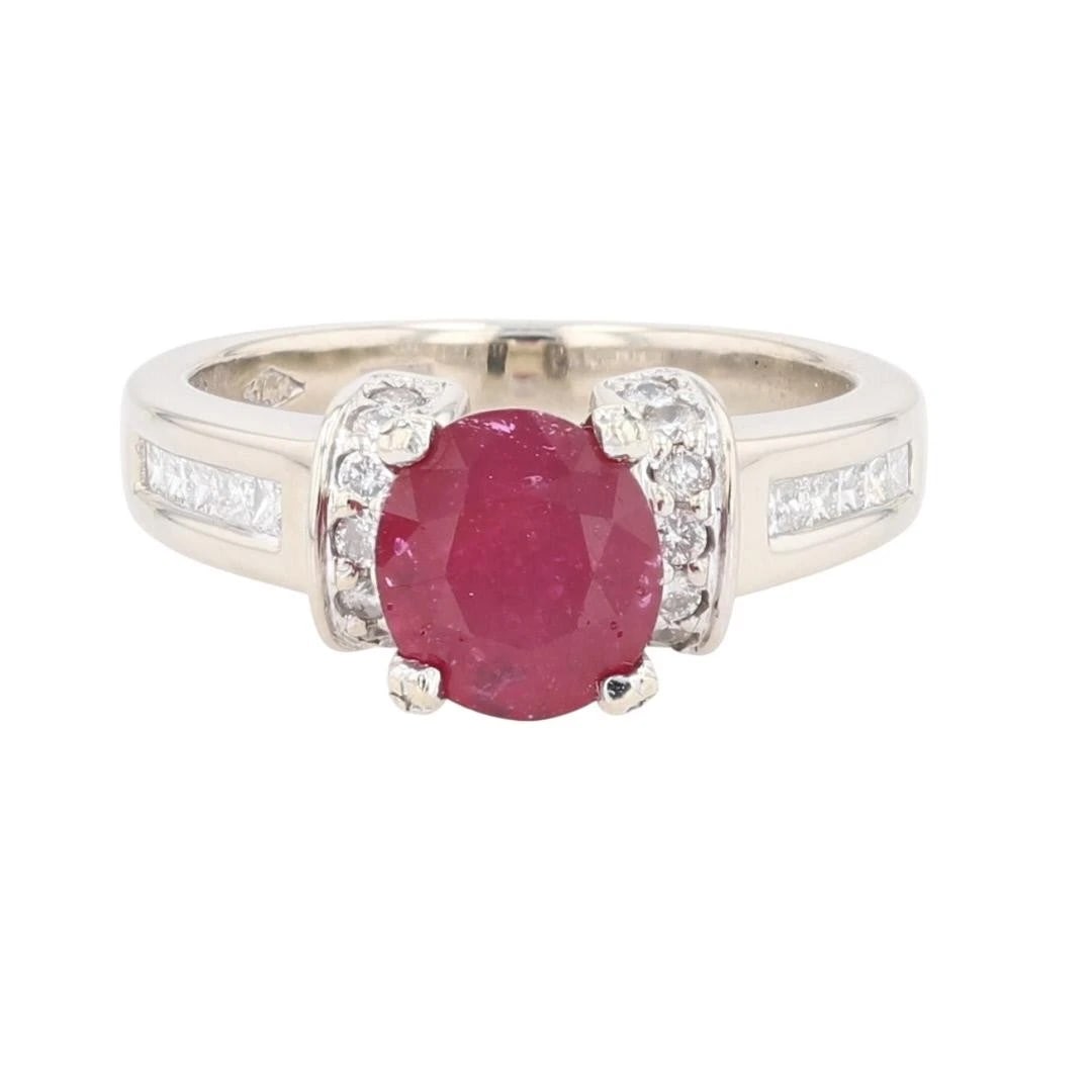 OVAL CUT RUBY W/ DIAMOND ACCENTS STATEMENT RING: Oval Cut Ruby w/ Diamond Accents Statement Ring Brand: Unbranded Type: Ring Material: 14k White Gold Main Stone/Creation Ruby Color: None Size: 6.25 US Accessories: None Accessories Notice