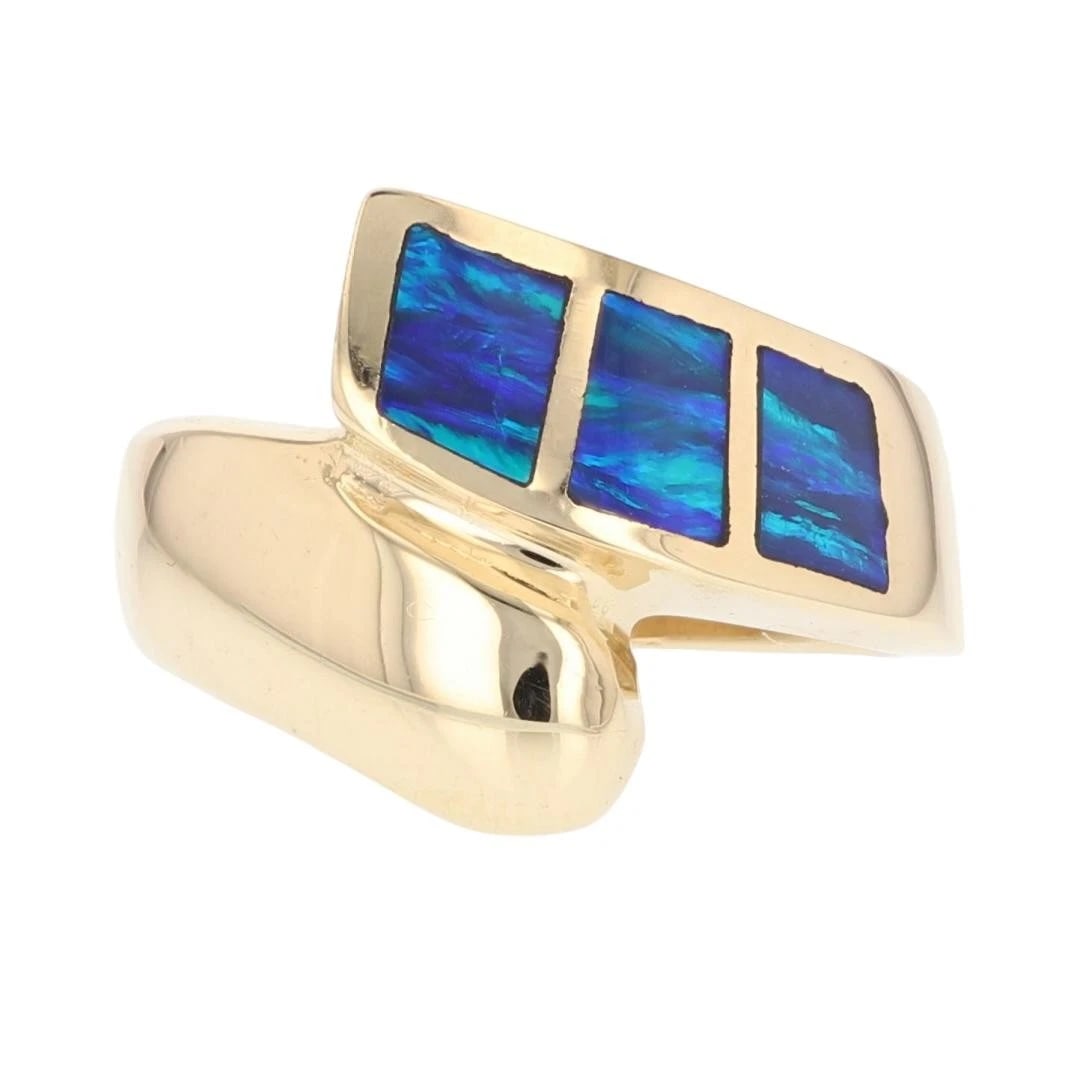 BLACK OPAL THREE-STONE INLAY BYPASS WRAP STYLE RING: Black Opal Three-Stone Inlay Bypass Wrap Style Ring Brand: Unbranded Type: Ring Material: 14k Yellow Gold Main Stone/Creation Natural Color: Main Stone Color: Blue/Green Play of Color Size: