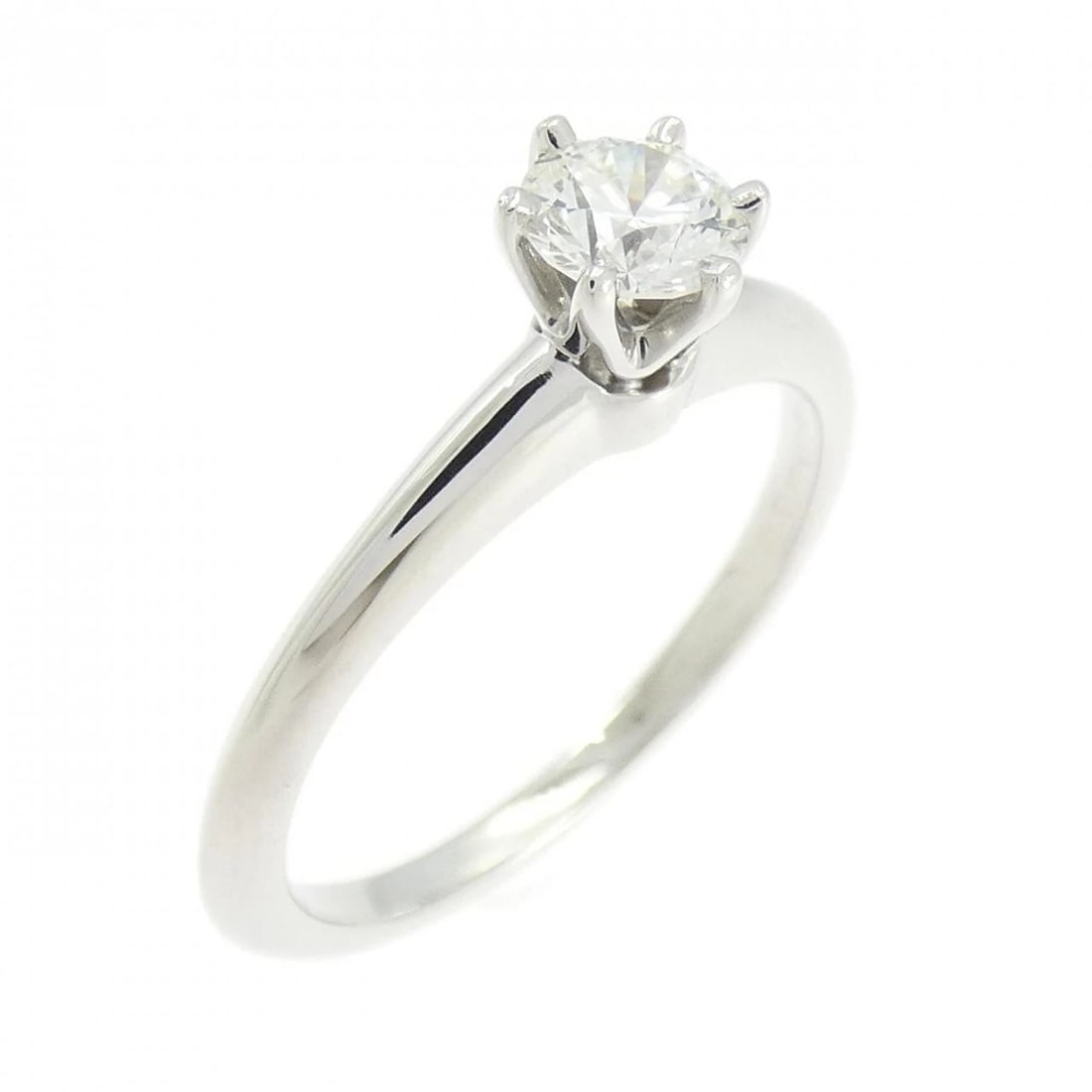 TIFFANY CLASSIC SOLITAIRE RING: Tiffany Classic Solitaire Ring Brand: Tiffany Type: Ring Material: Platinum 950 Main Stone/Creation Natural Color: Platinum Size: 6.5-7 (US size) Accessories: None Accessories Notice: When