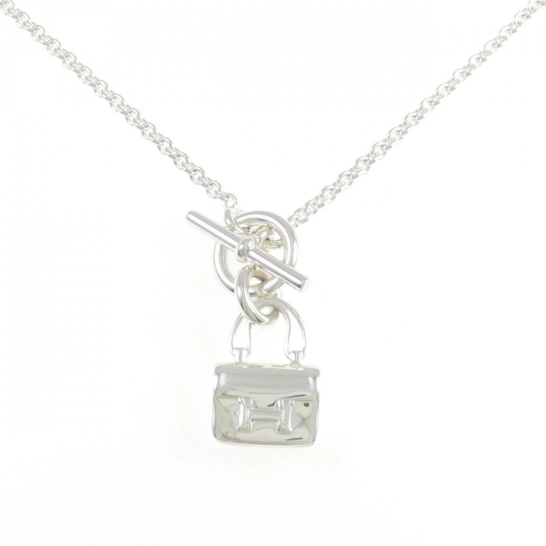 HERMES AMULET CONSTANCE NECKLACE: HERMES Amulet Constance Necklace Brand: HERMES Type: Necklace Material: 925 Silver Color: Silver Size: 41cm Accessories: None Accessories Notice: When purchasing pre-owned goods, please refer