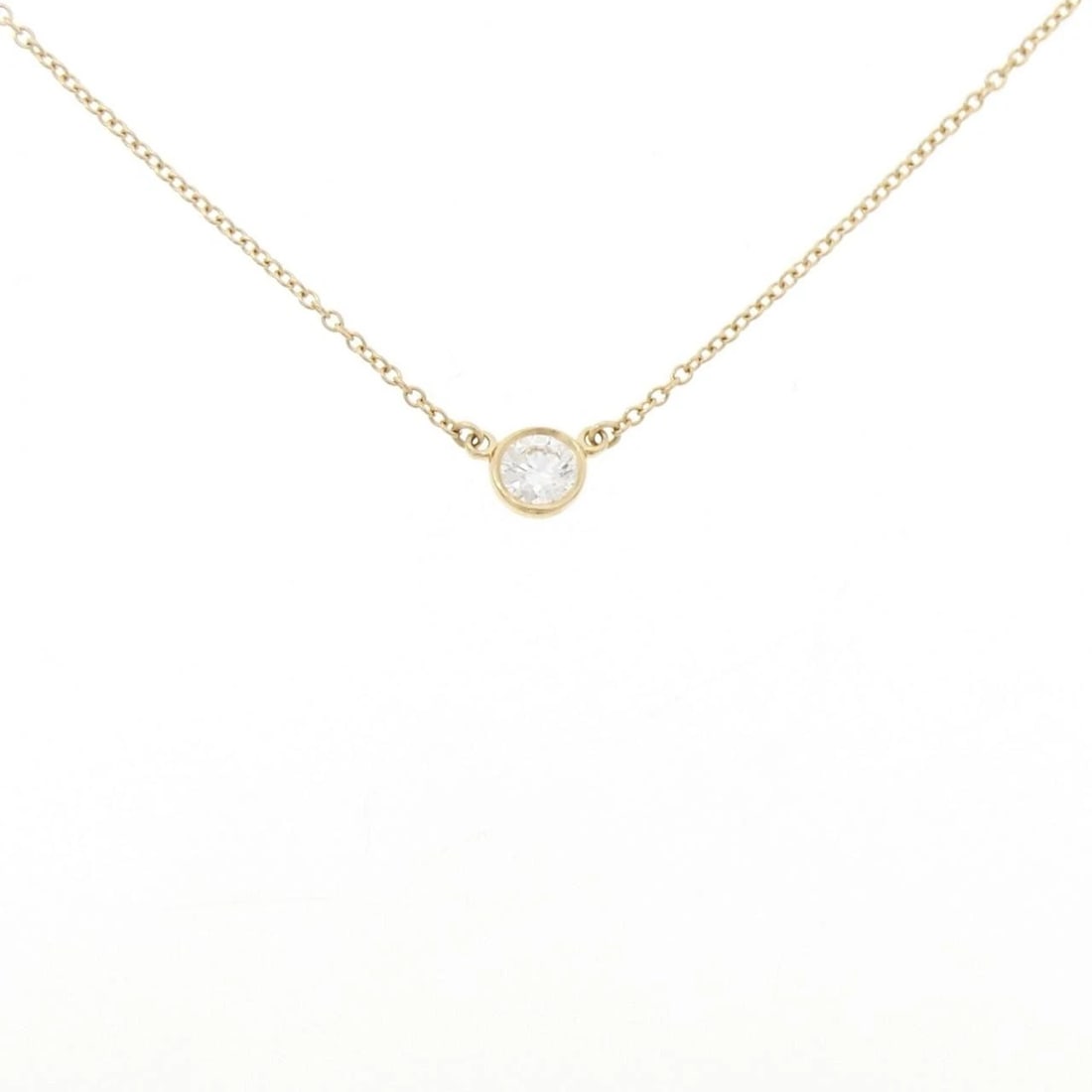 TIFFANY & CO. BY THE YARD NECKLACE: Tiffany & Co. By the Yard Necklace Brand: Tiffany Type: Necklace Material: 750 Yellow Gold Main Stone/Creation Natural Color: Yellow Gold Size: 41cm Accessories: None Accessories Notice: When