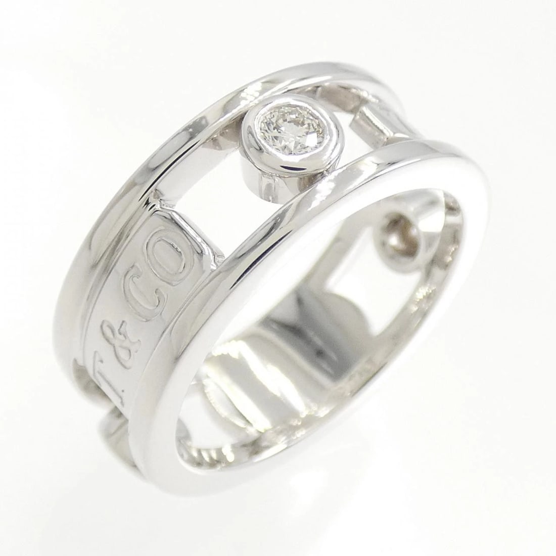 TIFFANY ELEMENT RING: Tiffany Element Ring Brand: Tiffany Type: Ring Material: 750 White Gold Main Stone/Creation Natural Color: White Gold Size: 4-4.5 (US size) Accessories: None Accessories Notice: When