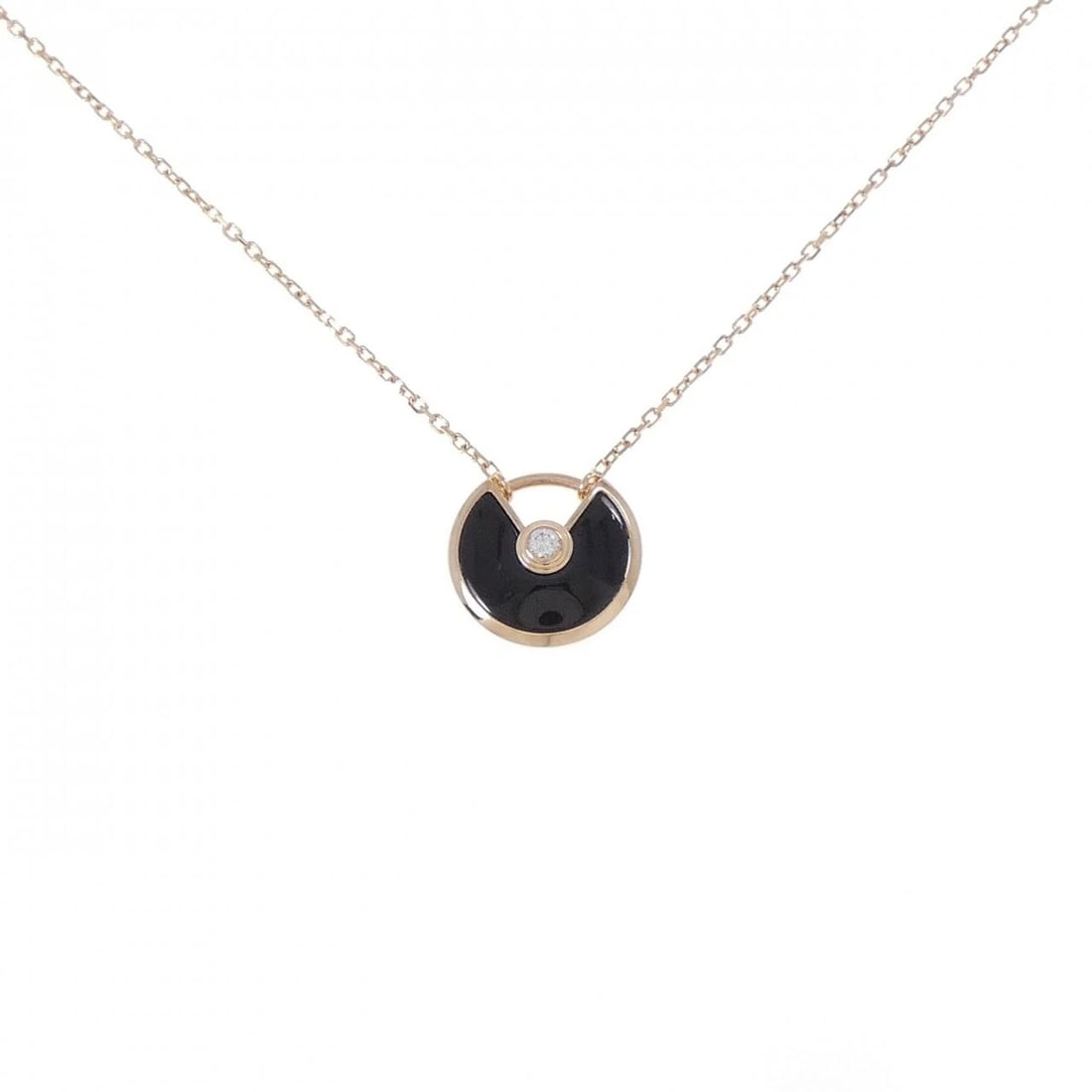CARTIER AMULET EXTRA SMALL NECKLACE: Cartier Amulet Extra Small Necklace Brand: Cartier Type: Necklace Material: 750 Pink Gold Main Stone/Creation Onyx Color: Pink Gold Size: 38 41cm Accessories: None Accessories Notice: When