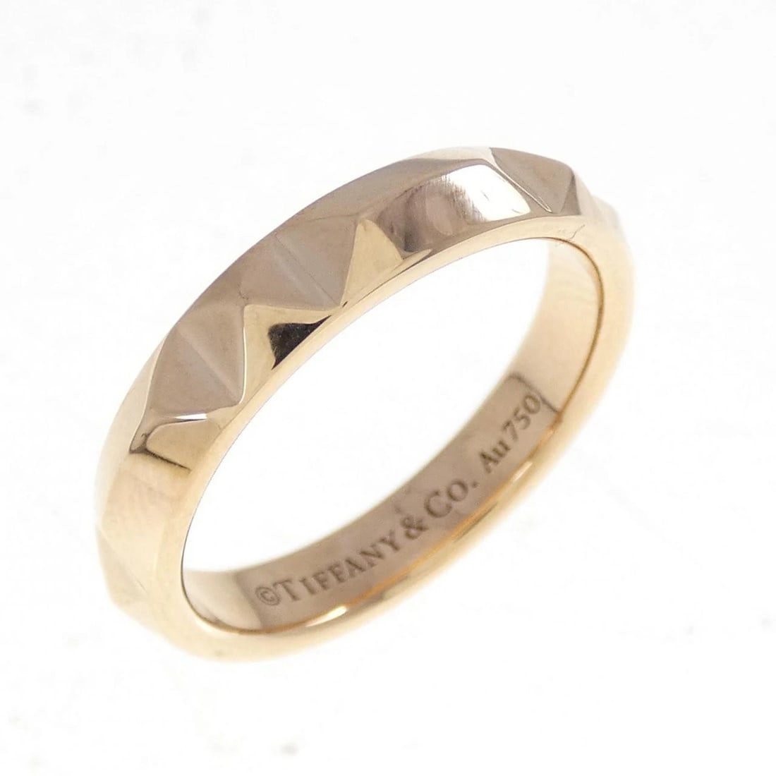 TIFFANY T TRUE BAND RING: Tiffany T True Band Ring Brand: Tiffany Type: Ring Material: 750 Pink Gold Color: Pink Gold Size: 7-7.5 (US size) Accessories: None Accessories Notice: When purchasing pre-owned goods, ple