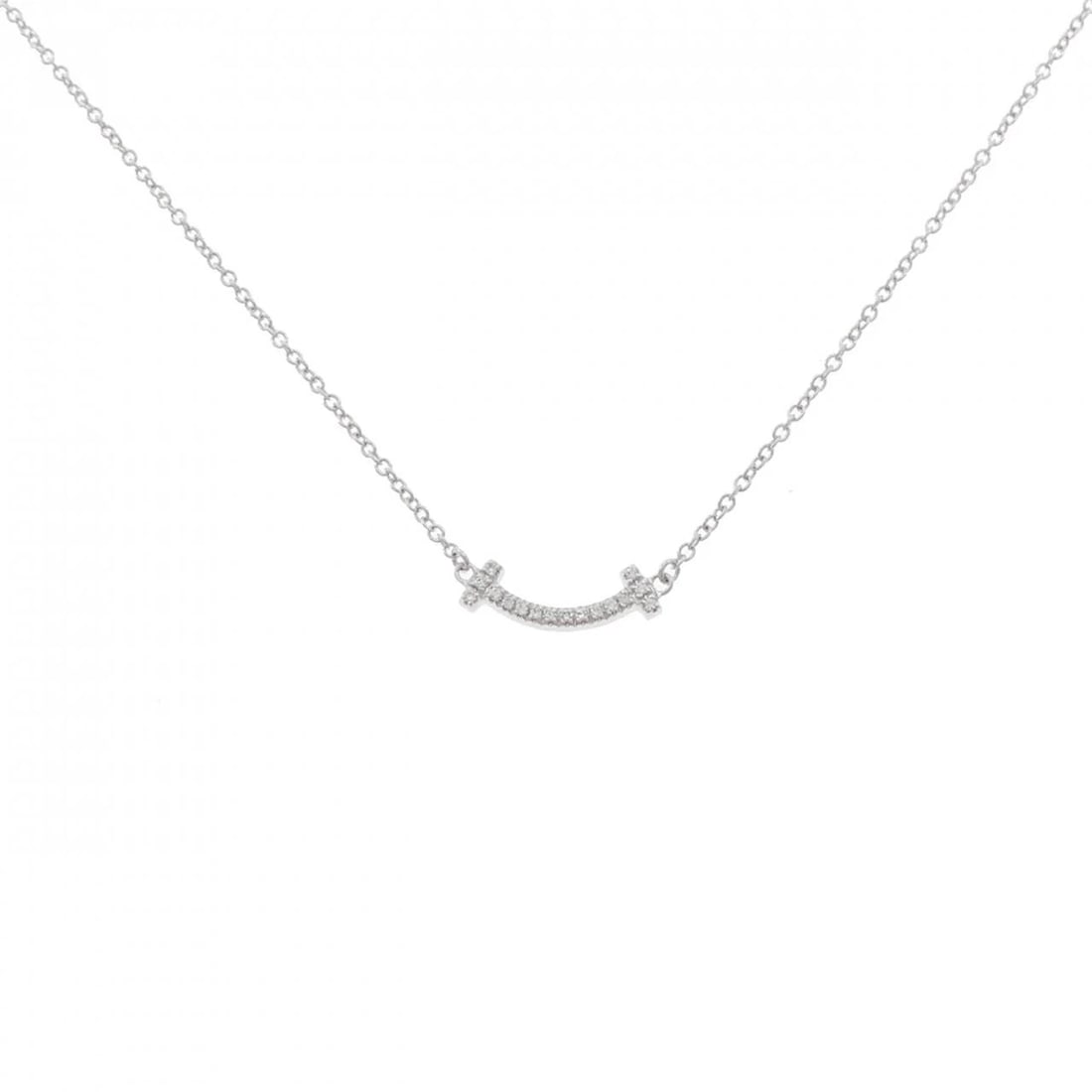 TIFFANY T SMILE MINI NECKLACE: Tiffany T Smile mini Necklace Brand: Tiffany Type: Necklace Material: 750 White Gold Main Stone/Creation Natural Color: White Gold Size: 41/46cm Accessories: None Accessories Notice: When