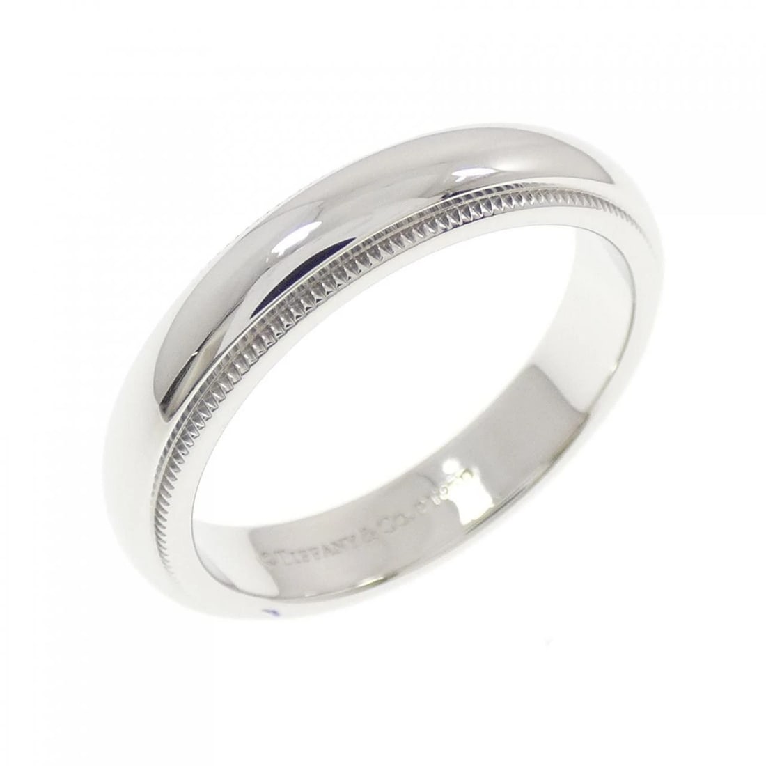 TIFFANY & CO. MILGRAIN RING: Tiffany & Co. Milgrain Ring Brand: Tiffany Type: Ring Material: Platinum 950 Color: Platinum Size: 7.5-8 (US size) Accessories: None Accessories Notice: When purchasing pre-owned goods,