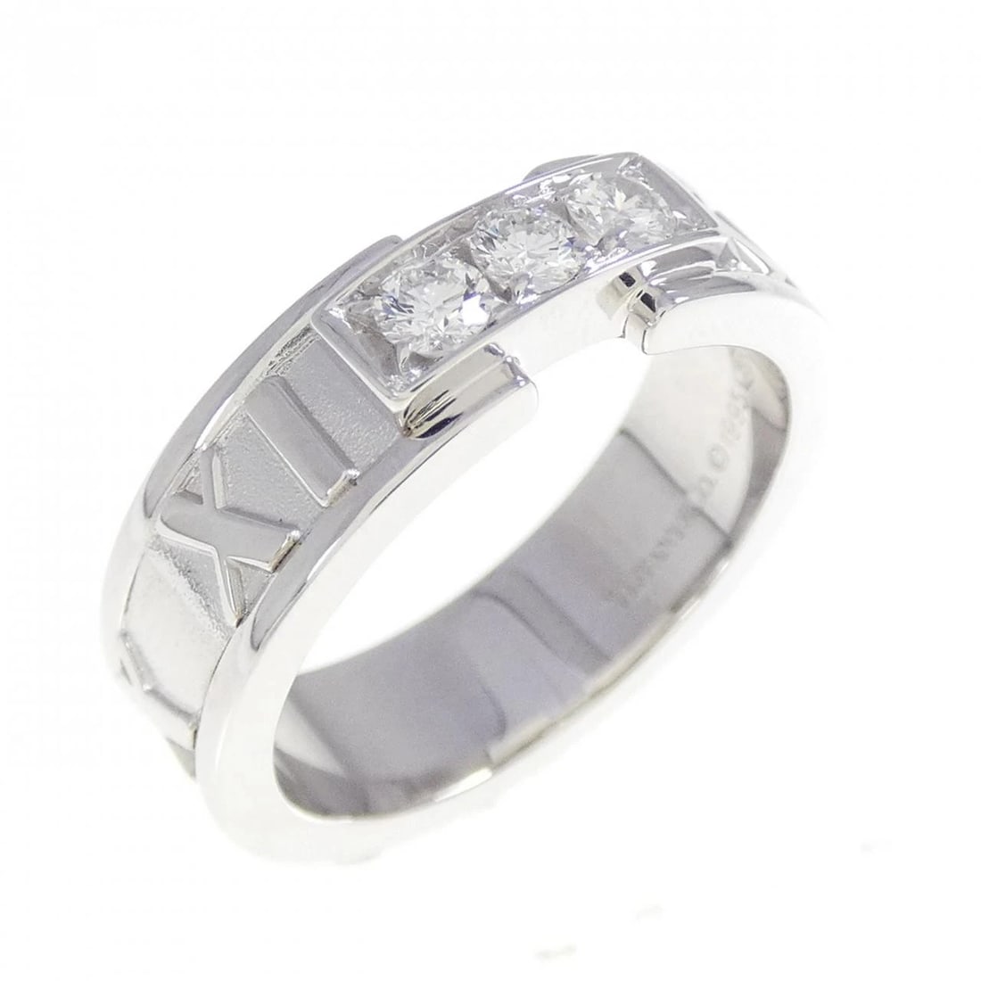 TIFFANY & CO. ATLAS RING: Tiffany & Co. Atlas Ring Brand: Tiffany Type: Ring Material: 750 White Gold Main Stone/Creation Natural Color: White Gold Size: 5 (US size) Accessories: None Accessories Notice: When