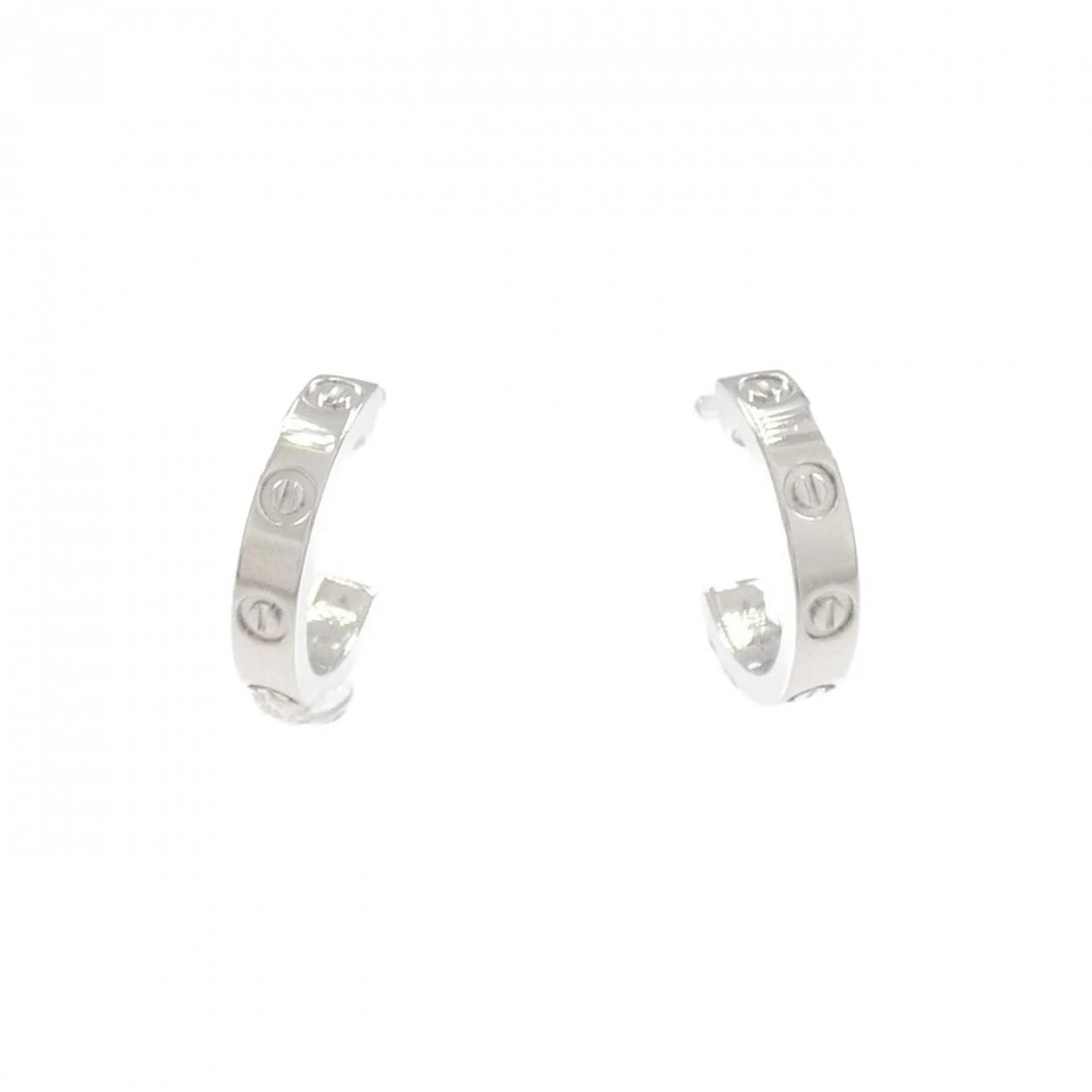 CARTIER MINI LOVE EARRINGS: Cartier Mini Love Earrings Brand: Cartier Type: Earrings Material: 750 White Gold Color: White Gold Size: ActualSize HxW: 12.6mmx2.5mm Accessories: None Accessories Notice: When purchasing