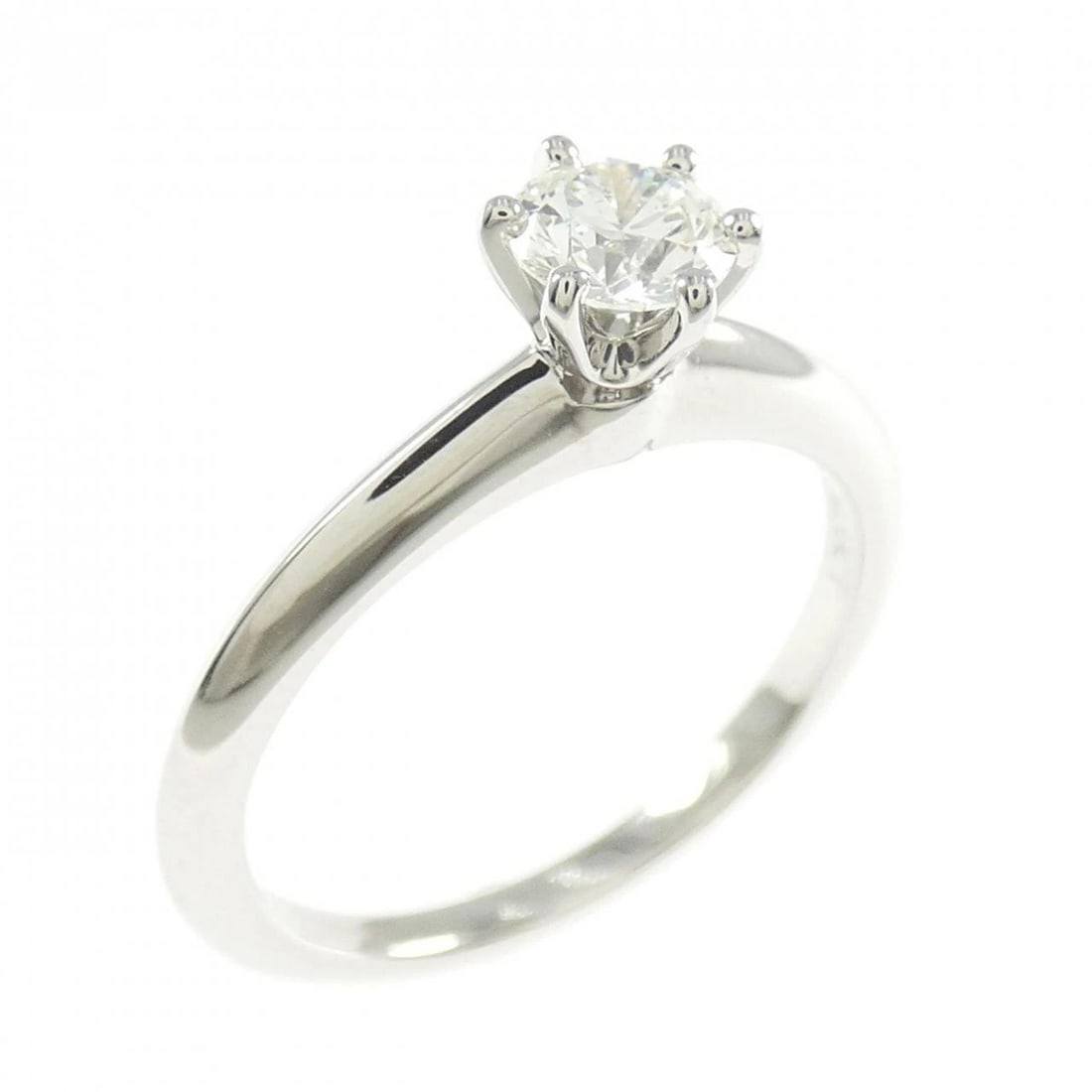 TIFFANY CLASSIC SOLITAIRE RING: Tiffany Classic Solitaire Ring Brand: Tiffany Type: Ring Material: Platinum 950 Main Stone/Creation Natural Color: Platinum Size: 5 (US size) Accessories: None Accessories Notice: When pur