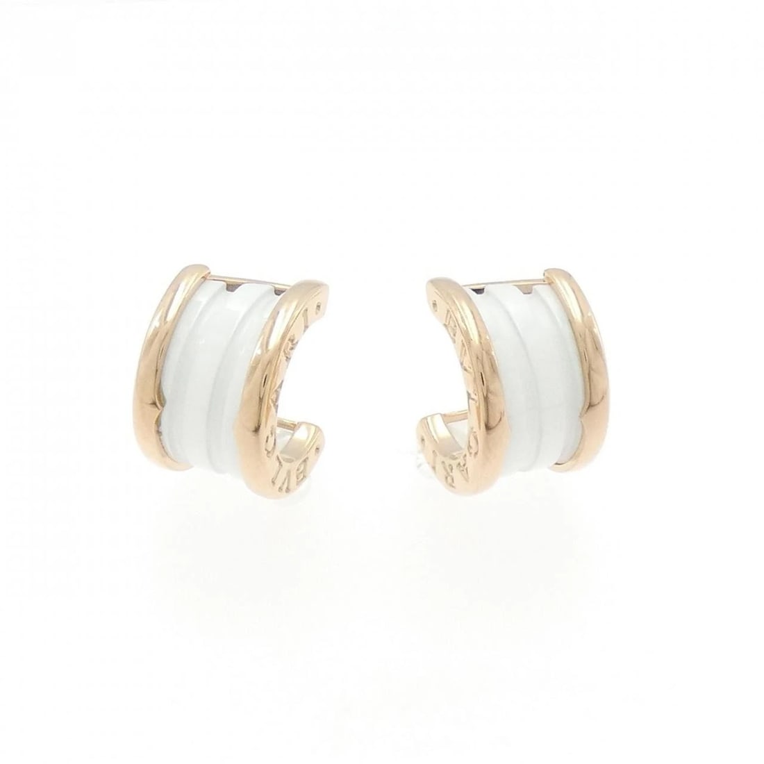 BVLGARI B.ZERO1 EARRINGS: BVLGARI B.zero1 Earrings Brand: BVLGARI Type: Earrings Material: 750 Pink Gold ceramic Color: Pink Gold ceramic Size: ActualSize HxW: 14.7mmx9.3mm Accessories: None Accessories Notice: When