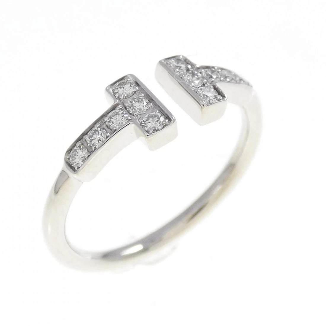 TIFFANY T WIRE RING: Tiffany T Wire Ring Brand: Tiffany Type: Ring Material: 750 White Gold Main Stone/Creation Natural Color: White Gold Size: 4.5-5 (US size) Accessories: None Accessories Notice: When