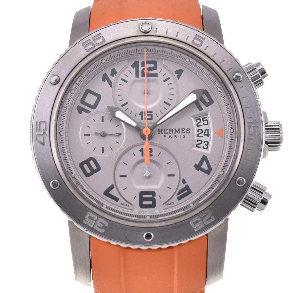 HERMES CLIPPER TITANIUM/SS CHRONOGRAPH WATCH: HERMES Clipper Titanium/SS Chronograph Brand: HERMES Type: Wristwatch Material: Band Material rubber, Case Material Titanium / Stainless Steel Color: Dial Color Silver Band Color Orange Case Color