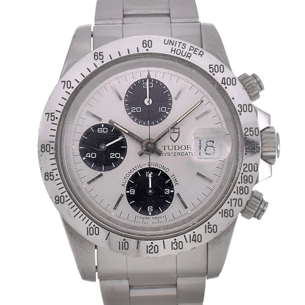 TUDOR OYSTER DATE CHRONO WATCH: TUDOR Oyster Date Chrono Watch Brand: TUDOR Type: Wristwatch Material: Band Material Stainless Steel, Case Material Stainless Steel Color: Dial Color Black / Silver Band Color Silver Case Color