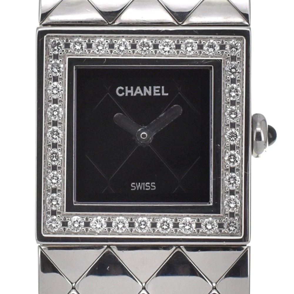 CHANEL MATRASSE BEZEL DIAMOND BLACK DIAL WATCH: CHANEL Matrasse Bezel Diamond black Dial Watch Brand: CHANEL Type: Wristwatch Material: Band Material Stainless Steel, Case Material Stainless Steel Color: Dial Color black Band Color Silver Case C