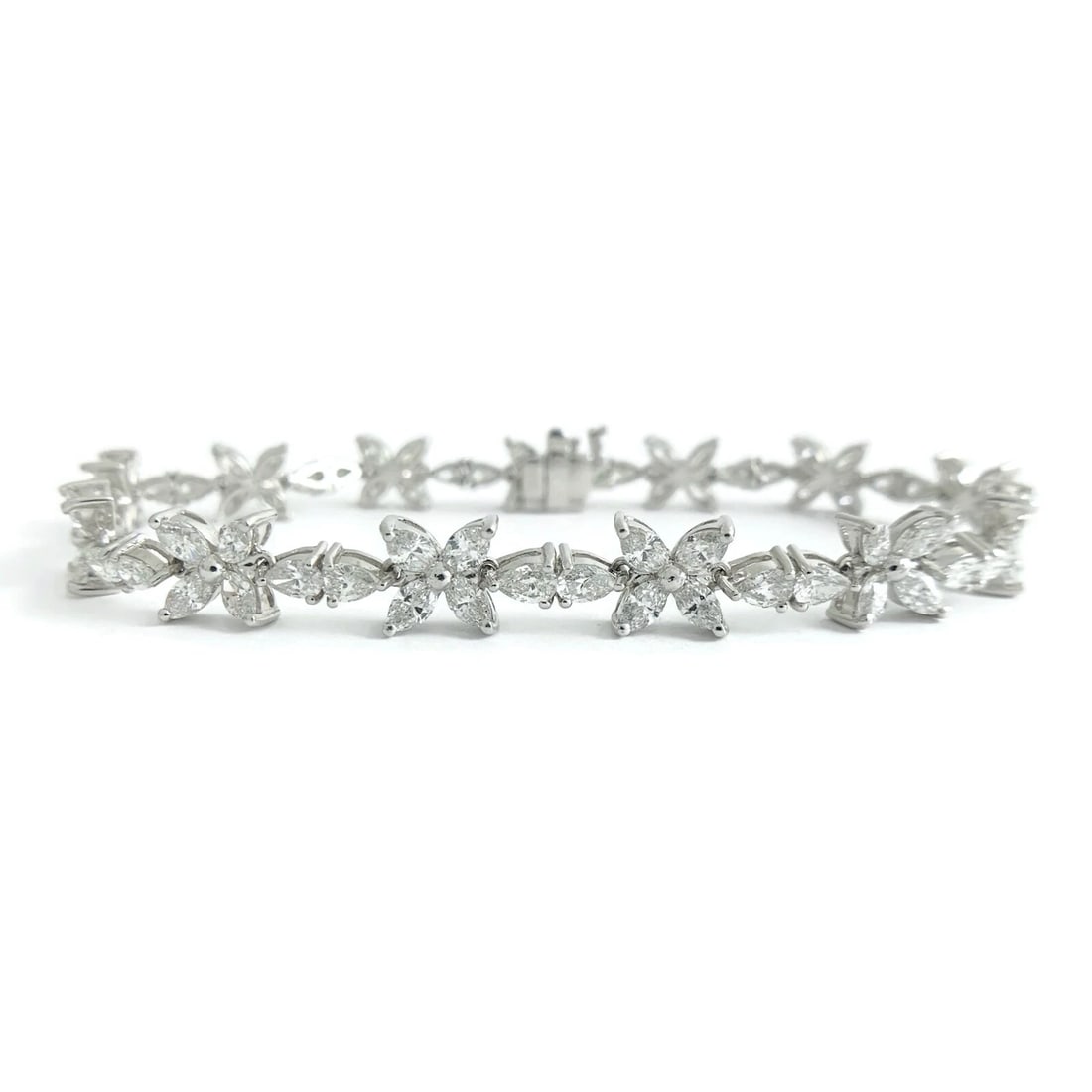 PEAR MARQUISE FLOWER DIAMOND TENNIS BRACELET PLATINUM: Pear Marquise Flower Diamond Tennis Bracelet Platinum Brand: Unbranded Type: Bracelet Material: platinum Main Stone/Creation Natural Color: White Size: Length: 7.5 inches Width: 7.3 mm Accessorie