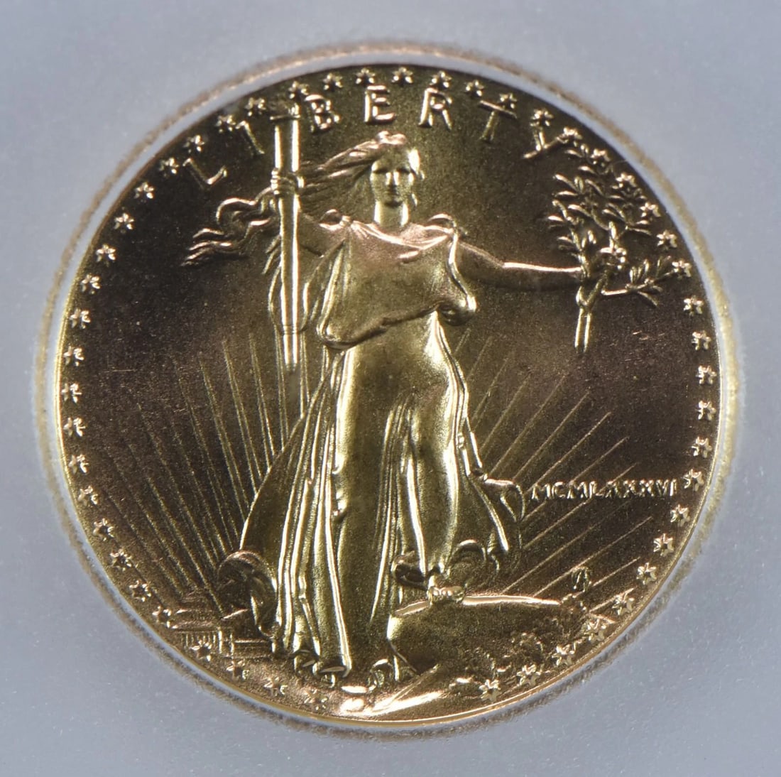 1986 $5 AMERICAN GOLD EAGLE: 1986 $5 American Gold Eagle Grade : MS70 Composition : Gold Denomination : None Year : 1986 Country of Origin : None Mint Location : Philadelphia Brand/Mint : None Accessories: N