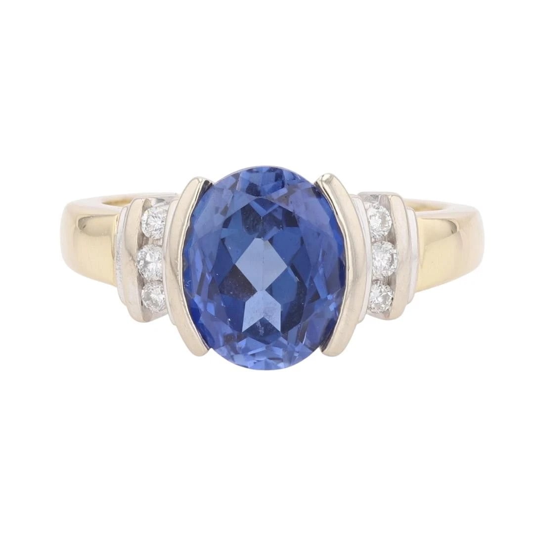 LAB-CREATED OVAL SAPPHIRE AND DIAMOND RING (1 of 2)