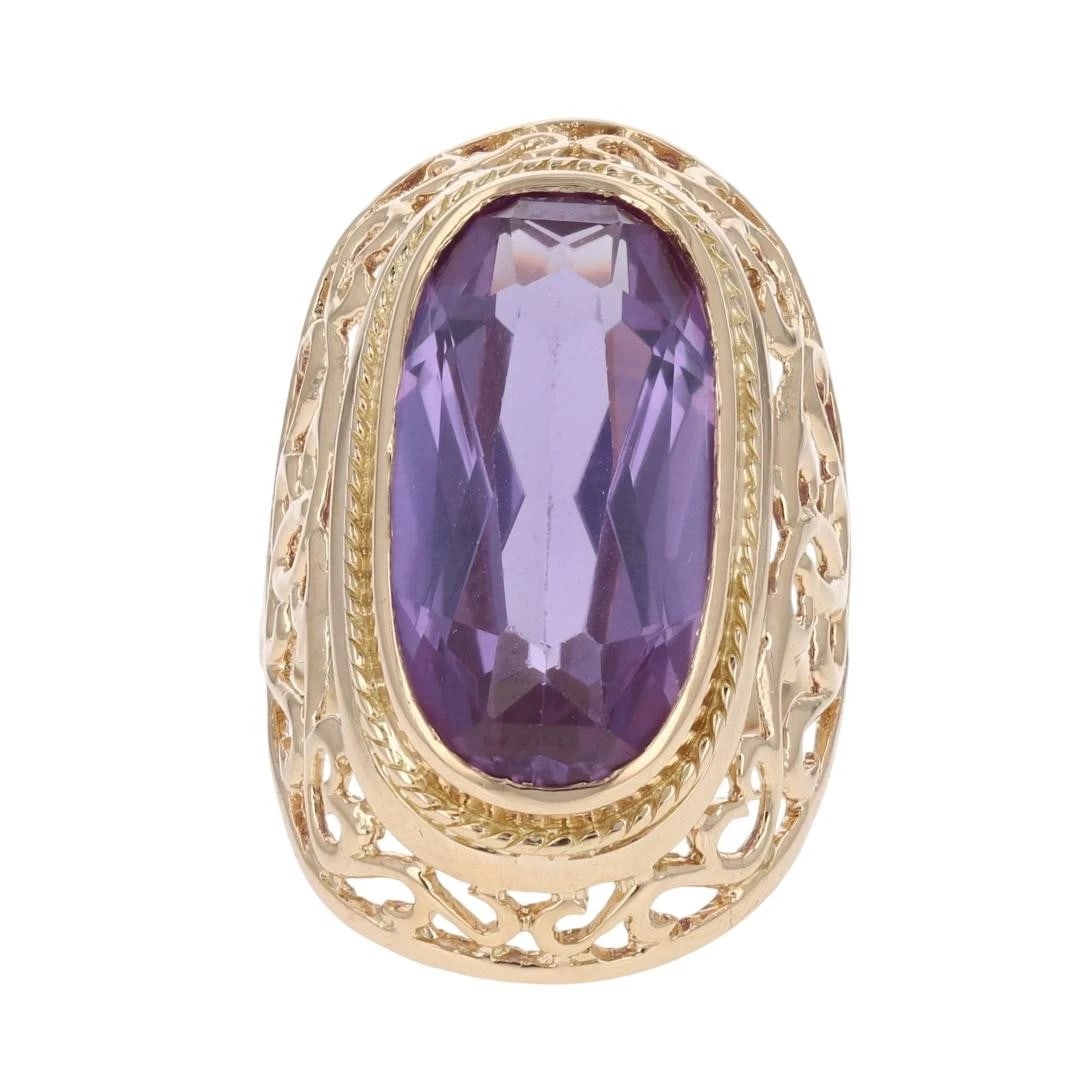 LAB-CREATED PURPLE SAPPHIRE SOLITAIRE RING: Lab-Created Purple Sapphire Solitaire Ring Brand: Unbranded Type: Ring Material: 14k Yellow Gold Main Stone/Creation Sapphire Color: Main Stone Color: Reddish Purple Size: 6.75 US Accessories: No