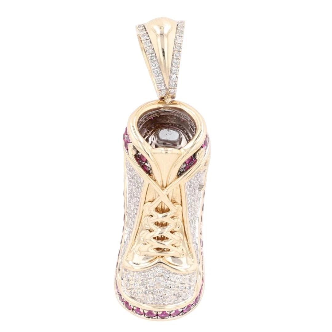 ROUND RUBY & DIAMOND JORDAN SNEAKER PENDANT: Round Ruby & Diamond Jordan Sneaker Pendant Brand: Unbranded Type: Pendant Material: 10k Yellow Gold Main Stone/Creation Natural Color: Main Stone Color: Medium Moderately Strong Red Size: