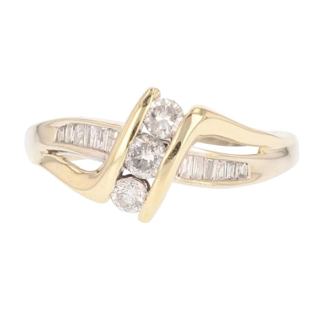 ROUND DIAMOND CHANNEL-SET CROSSOVER BAND RING: Round Diamond Channel-Set Crossover Band Ring Brand: Unbranded Type: Ring Material: 14k Multi-Tone Gold Main Stone/Creation Natural Color: None Size: 7 US Accessories: None Accessories Not