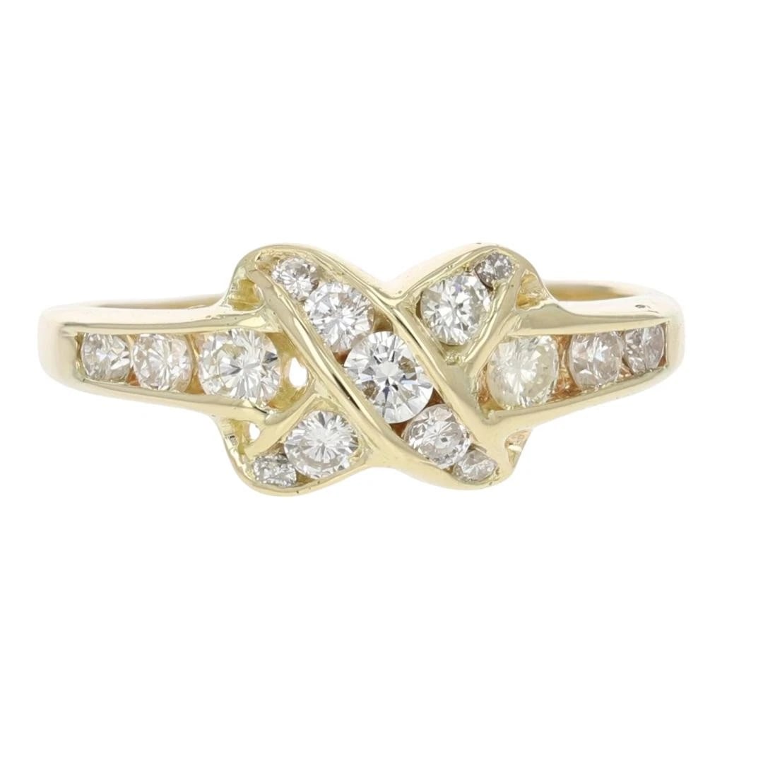 ROUND CUT DIAMOND CHANNEL-SET CRISSCROSS RING: Round Cut Diamond Channel-Set Crisscross Ring Brand: Unbranded Type: Ring Material: 14k Yellow Gold Main Stone/Creation Natural Color: None Size: 10.25 US Accessories: None Accessories