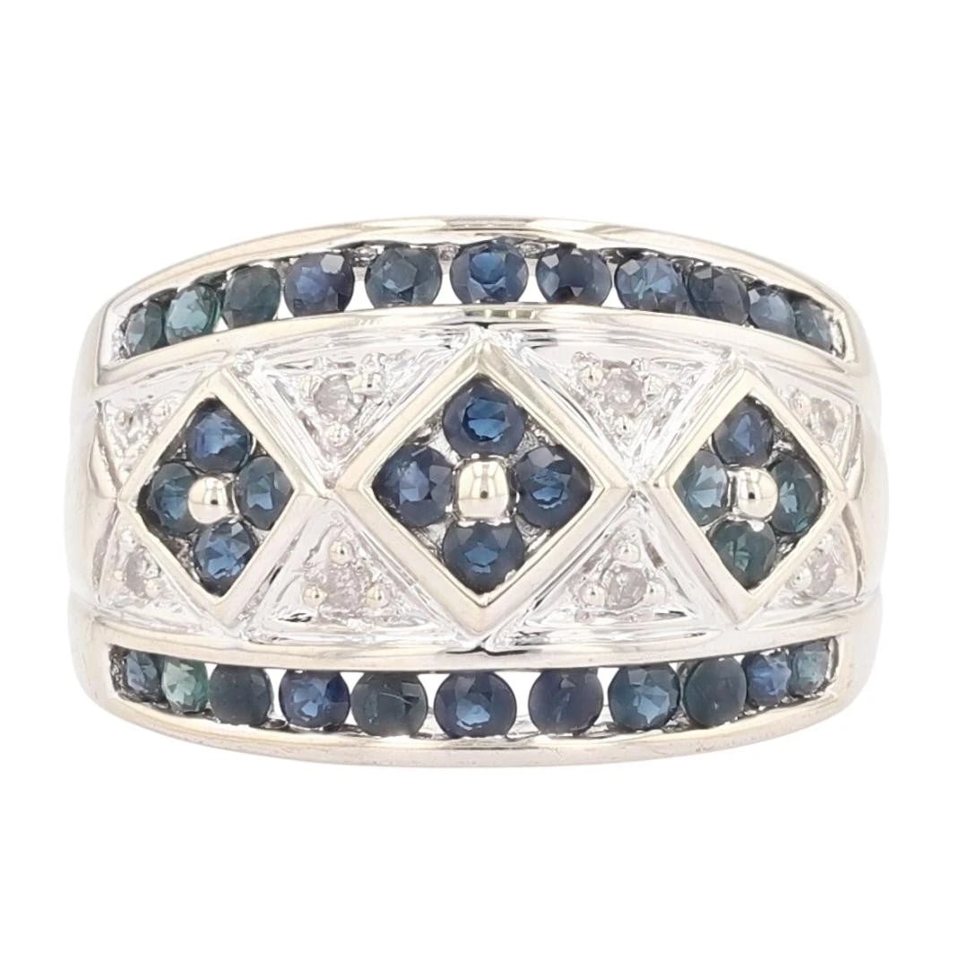 ROUND SAPPHIRE AND DIAMOND DOME STYLE BAND RING: Round Sapphire and Diamond Dome Style Band Ring Brand: Unbranded Type: Ring Material: 14k White Gold Main Stone/Creation Sapphire Color: Main Stone Color: Dark Slightly Grayish Blue Size: 7.25