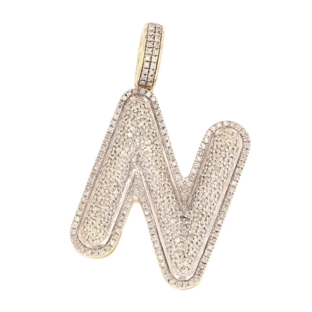 DIAMOND PAVÉ CAPITAL LETTER SHAPED PENDANT: Diamond Pavé Capital Letter Shaped Pendant Brand: Unbranded Type: Pendant Material: 10k Yellow Gold Main Stone/Creation Natural Color: None Size: Pendant Measurement: 1.5" x 3/4" Accessories: No
