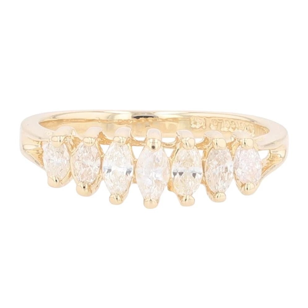 MARQUISE CUT DIAMOND PRONG SET STATEMENT RING: Marquise Cut Diamond Prong Set Statement Ring Brand: Magic Glo Type: Ring Material: 14k Yellow Gold Main Stone/Creation Natural Color: None Size: 5.25 US Accessories: None Accessories Notice: