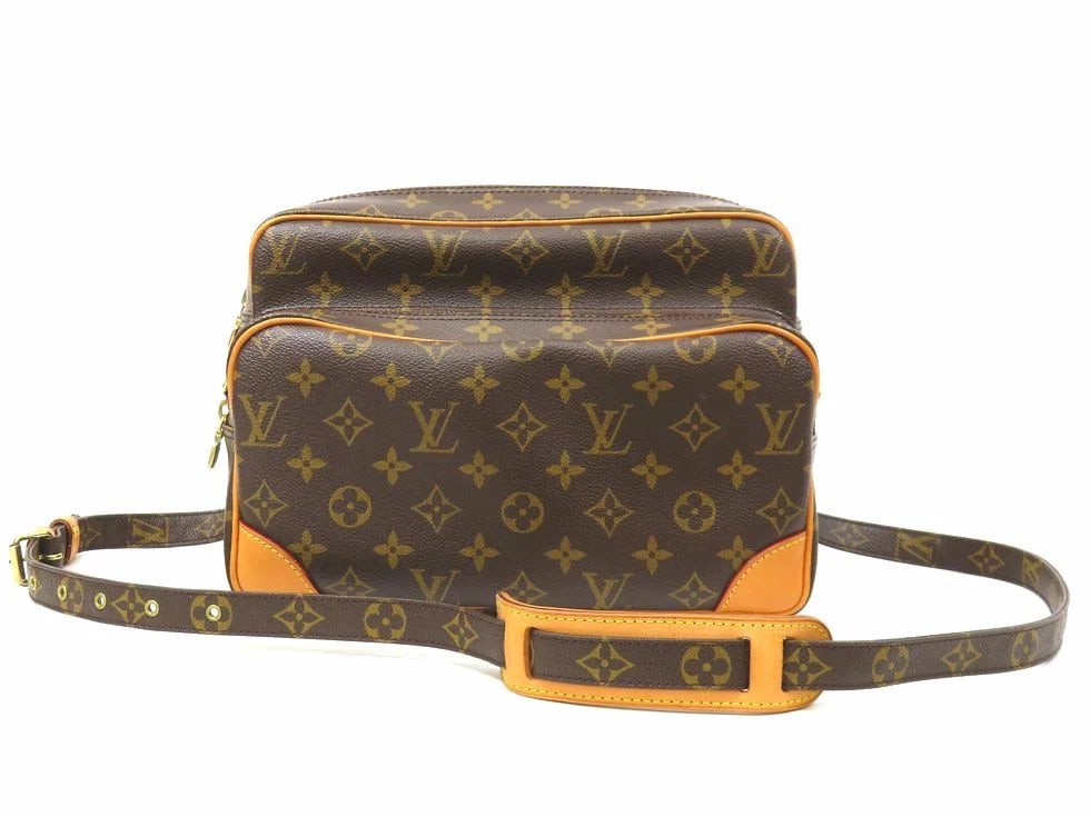 LOUIS VUITTON MONOGRAM NILE SHOULDER BAG: Louis Vuitton Monogram Nile Shoulder Bag Brand: Louis Vuitton Type/Style: Handbag Material: Monogram Color: None Size: D 27 x H 20 x G 8 cm Accessories: None Accessories Notice: When