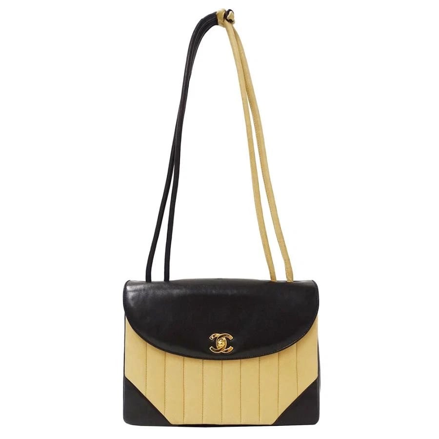 CHANEL MADEMOISELLE SHOULDER BAG LAMBSKIN BLACK: Chanel Mademoiselle Shoulder Bag Lambskin Black Brand: Chanel Type/Style: Handbag Material: Lambskin Color: Black/Beige/Gold Hardware Size: W: 25cm / H: 18cm (side) / D: 8.5cm (bottom) /