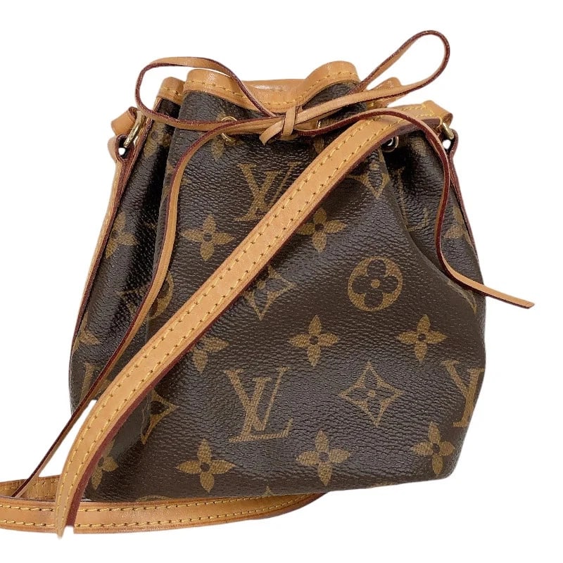 LOUIS VUITTON NANO NOE BROWN MONOGRAM SHOULDER BAG: LOUIS VUITTON Nano Noe Brown Monogram Shoulder Bag Brand: LOUIS VUITTON Type/Style: Handbag Material: Monogram Color: Brown Size: W: 13cm / H: 15cm / D: 10cm / Shoulder: 117cm Accessories:
