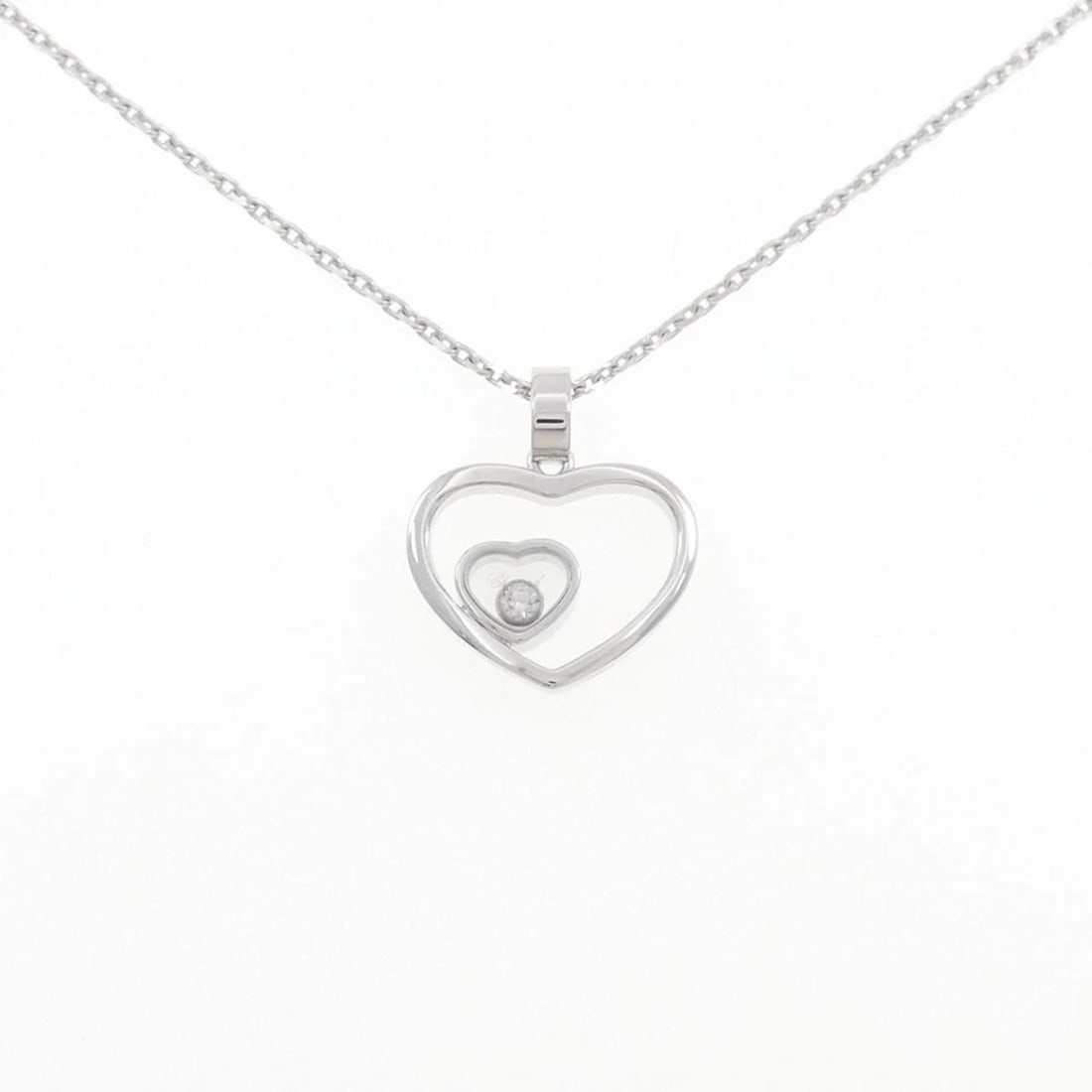 CHOPARD HEART DIAMOND NECKLACE: Chopard Heart Diamond Necklace Brand: Chopard Type: Necklace Material: 750 White Gold Main Stone/Creation Natural Color: White Gold Size: 42cm Accessories: None Accessories Notice: When pu