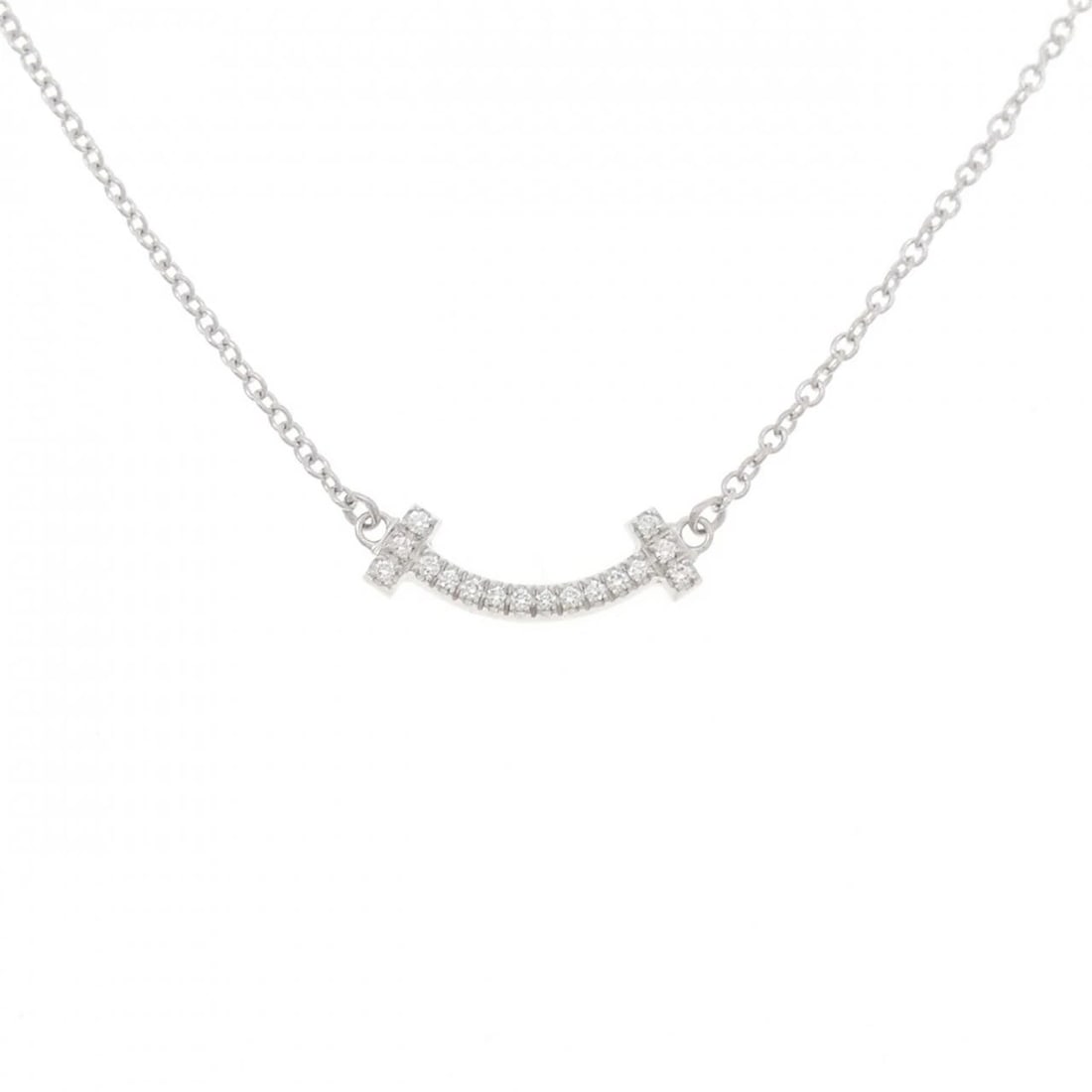 TIFFANY T SMILE MINI NECKLACE: Tiffany T Smile mini Necklace Brand: Tiffany Type: Necklace Material: 750 White Gold Main Stone/Creation Natural Color: White Gold Size: 41 45cm Accessories: None Accessories Notice: When